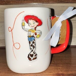 🥰 Rae Dunn DISNEY Pixar Toy Story JESSIE YEE HAW! Double Sided Mug with Lasso